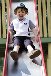 Boy on slide photo